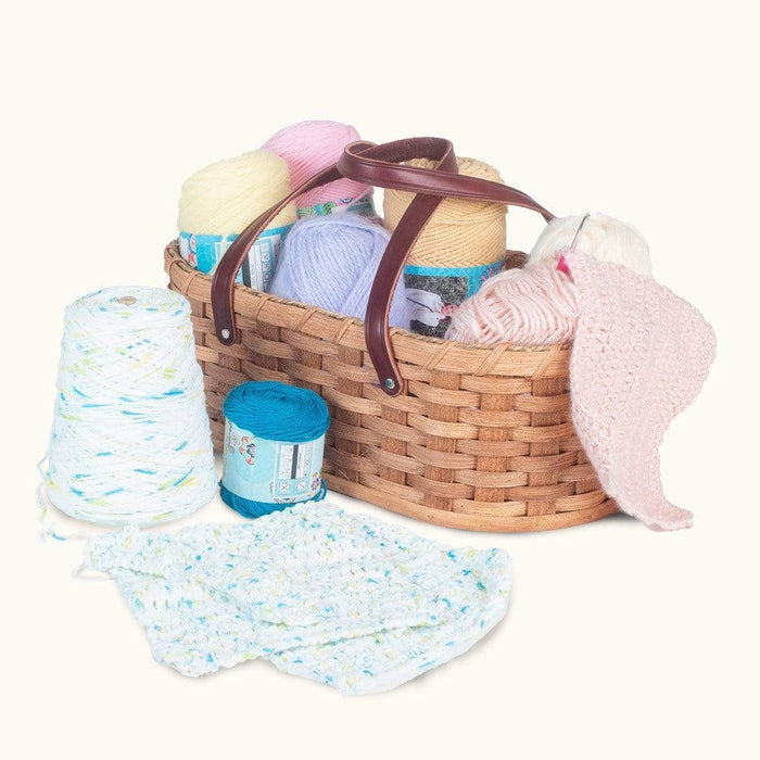 https://www.amishbaskets.com/cdn/shop/products/knitting-baskets-knitting-crochet-caddy-vintage-amish-wicker-yarn-basket-plain-28434113232999_700x700.jpg?v=1628096675