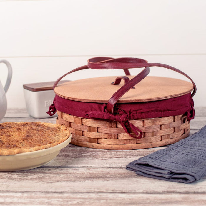 https://www.amishbaskets.com/cdn/shop/products/pie-baskets-single-pie-basket-amish-woven-wooden-pie-carrier-w-lid-plain-29674369056871_700x700.jpg?v=1660833608